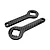 Two carbon fibre differential tools with distinct shaped cutouts laid out on a plain white background.