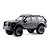 FMS Canyon RS RC rock crawler electric 4WD in black viewed from the side, showcasing off-road tires and scale body details.