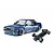 Dark blue E30RC drift car body with Pandem decals alongside its black RC chassis on a white background