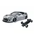Studio shot of a metal grey 86RB RC drift car body and its matching black chassis on a white background.