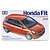 Tamiya 1/24 scale Honda Fit/Jazz plastic model kit box art showing an orange hatchback car.
