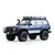 Studio shot of the FMS FCX10 Pro Toyota Land Cruiser LC80 RC rock crawler in blue, featuring a roof rack and bull bar.