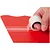 A hand applying a roll of clear hinge tape along the seam of a red foam model aircraft wing.