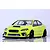Lime green Subaru WRX STI RC drift car body shell displayed on a reflective surface against a white brick wall background.