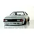 Silver RC drift car body shell mounted on a chassis with wide gold-rimmed wheels against a white background.
