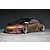 Custom painted RC drift car body shell of a Toyota GR86 in a metallic shift color on a studio display surface.