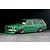 Green RC drift car body shell styled as a Mazda RX-3 Savanna sports wagon on a dark studio set