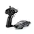 Kyosho Mini-Z Knight Rider RC car and black pistol-grip transmitter on a white background.