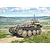 Painted plastic model kit of a German Flakpanzer 38 Gepard anti-aircraft vehicle with camouflage, parked in a grassy field.
