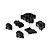 Set of black molded plastic transmission case parts and covers for an RC vehicle arranged on a white background.