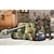 Box art painting of a 1/16 German Pak 40 anti-tank gun with three soldiers in a battlefield setting.