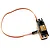 Savox SH-1357 digital mini servo featuring an orange housing and black top with connected wiring harness on a white background.