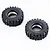Two black rubber RC crawler tires with aggressive tread patterns shown on a plain white background.