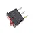 A black and red rocker switch with three metal terminals, isolated on a white background.