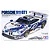 Tamiya 1/24 scale Porsche 911 GT1 model kit box art showing a white race car with blue and red Mobil 1 livery.