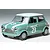 A 1/24 scale Tamiya Morris Mini Cooper model car, painted green with a white roof and racing number 23 on the hood and doors.