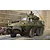 Box art illustration of a Canadian Grizzly AVGP armoured vehicle in a war-torn urban setting with a soldier in the turret.