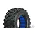 A single Pro-Line Badlands MX short course RC tyre with aggressive tread and a blue foam insert, isolated on a white background.