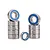 A set of nine metal ball bearings with blue rubber seals arranged in two stacks and one standing upright on a white background.