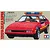 Box art for Tamiya 1/24 scale Toyota Celica Supra Long Beach GP Marshal Car model kit, featuring a red sports car with a light bar.