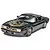 A 1/25 scale model of a black 1977 Pontiac Firebird from Smokey and the Bandit, featuring the iconic gold hood bird decal and gold snowflake wheels.