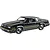 A completed 1/25 scale plastic model of a black 1985 Oldsmobile 442 FE3-X show car, viewed from the front three-quarter angle.