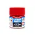 A 10ml glass jar of Tamiya LP-79 Flat Red lacquer paint with a red plastic screw-top lid, set against a white background.