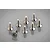 A set of eight silver-coloured metal countersunk head screws with hexagonal drive sockets arranged on a reflective grey surface.