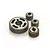 A set of four metal transmission gears of varying sizes arranged on a white background.
