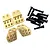 Four brass shock mounts and a set of black screws for an RC crawler, laid out on a white background.