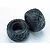 Two black Traxxas Anaconda 2.2 inch RC buggy rear tires with foam inserts, shown against a plain white background.