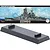 A Fujimi 1/700 scale IJN Kongo battleship model kit box art above a black plastic display stand.