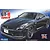 Box art for a Fujimi 1/24 scale Nissan GT-R Spec-V plastic model kit featuring a dark purple sports car against a blue gradient background.