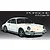 An illustration of a white 1969 Porsche 911S Coupe on a dark grey background, typical of a model kit box art.