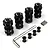 A set of four black aluminium 17mm hex adaptors with 10mm offset, including nuts, pins, and an L-wrench, by Yeah Racing.