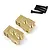 Two brass suspension link mounts for an RC car with four black mounting screws on a white background.