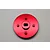 A red anodized aluminium spur gear adapter for HPI Baja 5B RC cars, featuring a circular plate with a central mounting hole and four smaller screw posts.