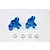 Two blue anodized aluminium RC axle carriers with four small white plastic bushings on a white background.