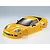A yellow Killerbody 1/10 scale Corvette GT2 RC car body shell, featuring detailed headlights, side mirrors, and tinted windows on a plain background.