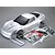 A silver painted 1/7 scale Corvette GT2 RC car body shell with included decal sheet, instruction manual, and small plastic accessory bags.