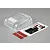 A clear polycarbonate RC truck hood and fender set with a decal sheet and two strips of double-sided adhesive tape on a grey background.
