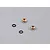 Two gold-anodized aluminium LED light holders and two black rubber O-rings on a grey background.