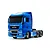 A studio shot of a Tamiya 1/14 scale MAN TGX 26.540 RC semi-truck model in light metallic blue against a white background.