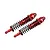 Two red GPM Racing aluminium RC shock absorbers with black springs on a white background.
