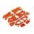 A set of bright orange RC car suspension arms and related plastic components arranged on a white background.