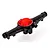 A black plastic RC car axle housing with a metallic red circular differential cover, viewed from an elevated angle against a white background.