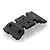 A black plastic RC car skid plate component with mounting holes and a textured surface, shown from a high-angle perspective.