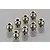 Eight small silver-coloured metal pivot balls arranged on a reflective grey surface.
