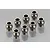 Eight small silver-coloured metal pivot balls arranged on a reflective grey surface.