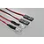 Two clear LED lights connected to red and black wires with black plastic servo-style connectors on a light grey background.